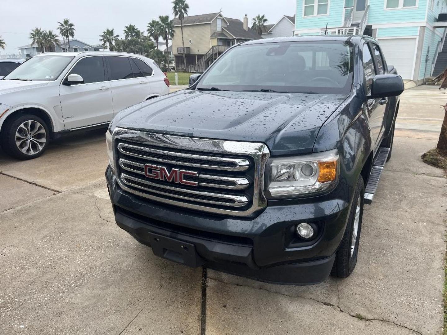 2019 BLUE GMC CANYON SLE Crew Cab 2WD (1GTG5CEN2K1) with an 3.6L V6 DOHC 24V engine, AUTOMATIC transmission, located at 2303 West Mt. Houston, Houston, 77038, (281) 507-3956, 29.771597, -95.339569 - Photo#1