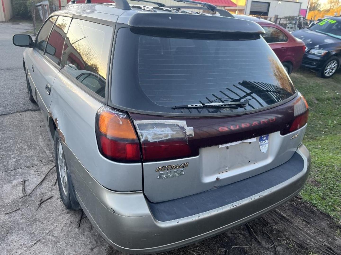 2003 WHITE SUBARU OUTBACK Wagon w/ All-weather Package (4S3BH675836) with an 2.5L H4 SOHC 16V engine, MANUAL transmission, located at 2303 West Mt. Houston, Houston, 77038, (281) 507-3956, 29.771597, -95.339569 - Photo#6