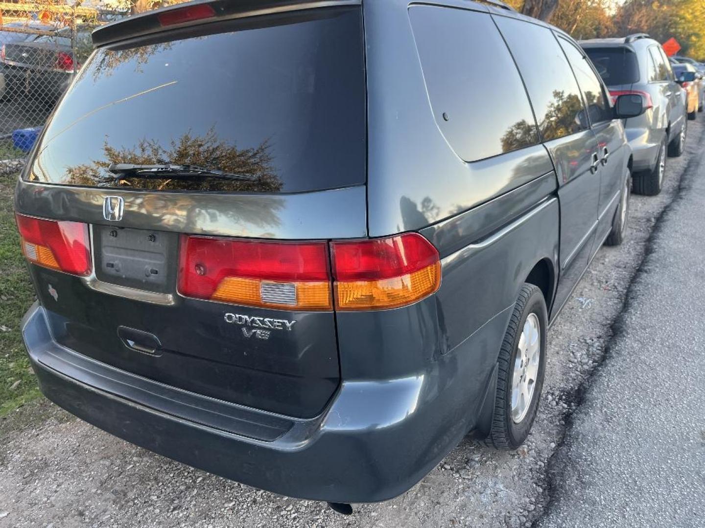 2003 BLUE HONDA ODYSSEY EX w/ Leather (5FNRL18943B) with an 3.5L V6 SOHC 24V engine, AUTOMATIC transmission, located at 2303 West Mt. Houston, Houston, 77038, (281) 507-3956, 29.771597, -95.339569 - Photo#1