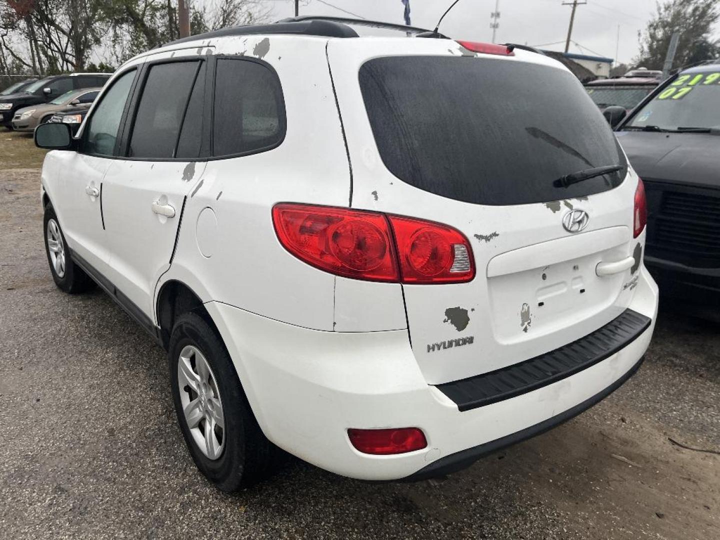 2009 BROWN HYUNDAI SANTA FE GLS AWD (5NMSG73D79H) with an 2.7L V6 DOHC 24V engine, AUTOMATIC transmission, located at 2303 West Mt. Houston, Houston, 77038, (281) 507-3956, 29.771597, -95.339569 - Photo#2