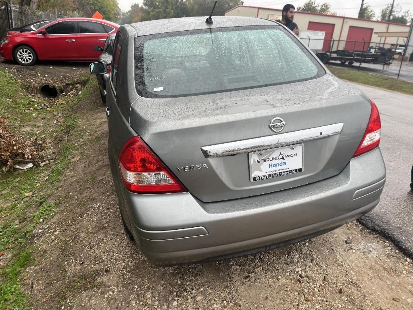 2010 BROWN NISSAN VERSA 1.8 S Sedan (3N1BC1AP2AL) with an 1.8L L4 DOHC 16V engine, AUTOMATIC transmission, located at 2303 West Mt. Houston, Houston, 77038, (281) 507-3956, 29.771597, -95.339569 - Photo#1