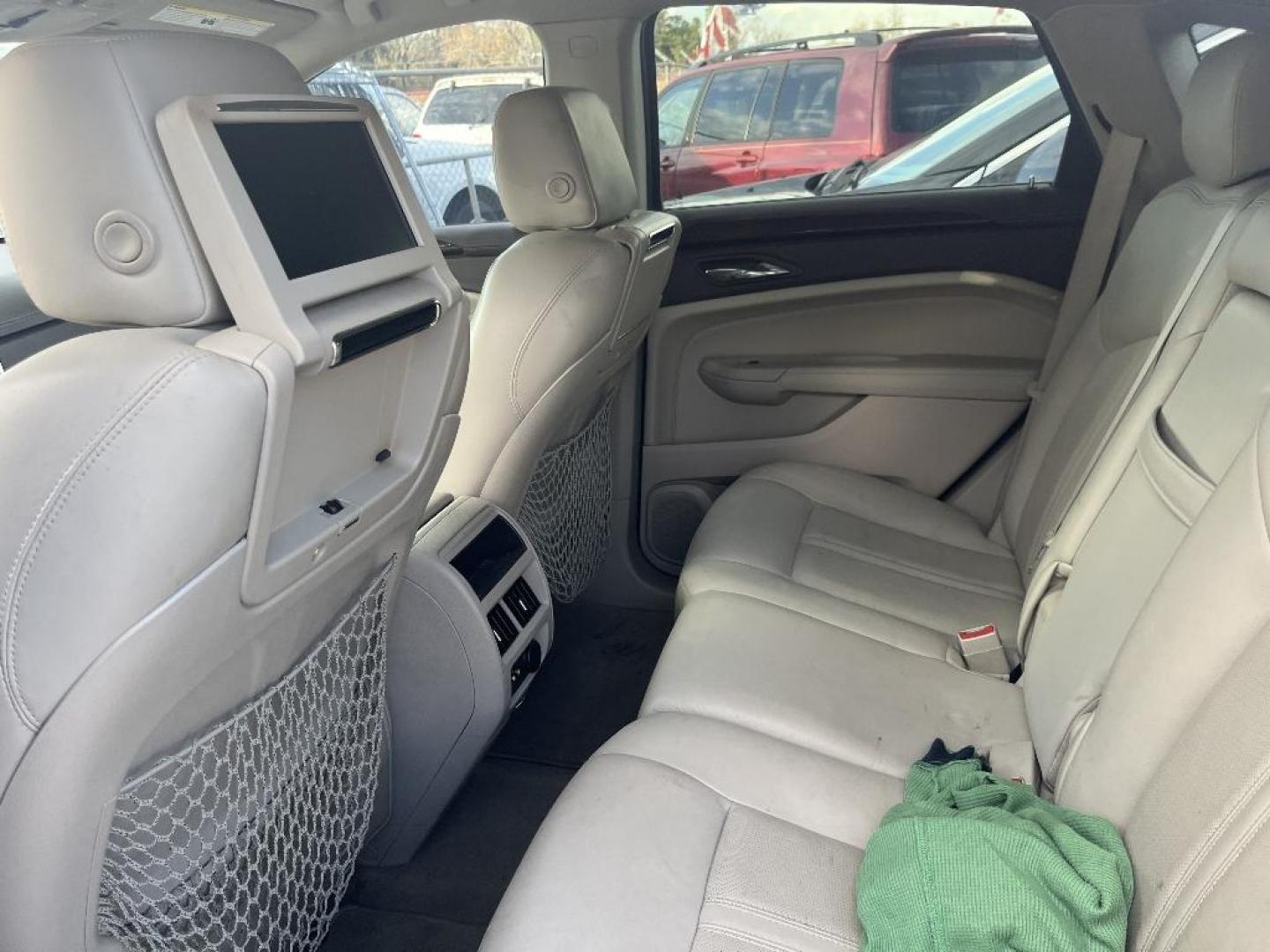 2010 WHITE CADILLAC SRX Luxury Collection (3GYFNAEY9AS) with an 3.0L V6 DOHC 24V engine, AUTOMATIC transmission, located at 2303 West Mt. Houston, Houston, 77038, (281) 507-3956, 29.771597, -95.339569 - Photo#2