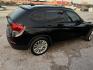 2014 BLACK BMW X1 xDrive28i (WBAVL1C59EV) with an 2.0L L4 DOHC 16V engine, AUTOMATIC transmission, located at 2303 West Mt. Houston, Houston, 77038, (281) 507-3956, 29.771597, -95.339569 - Photo#4