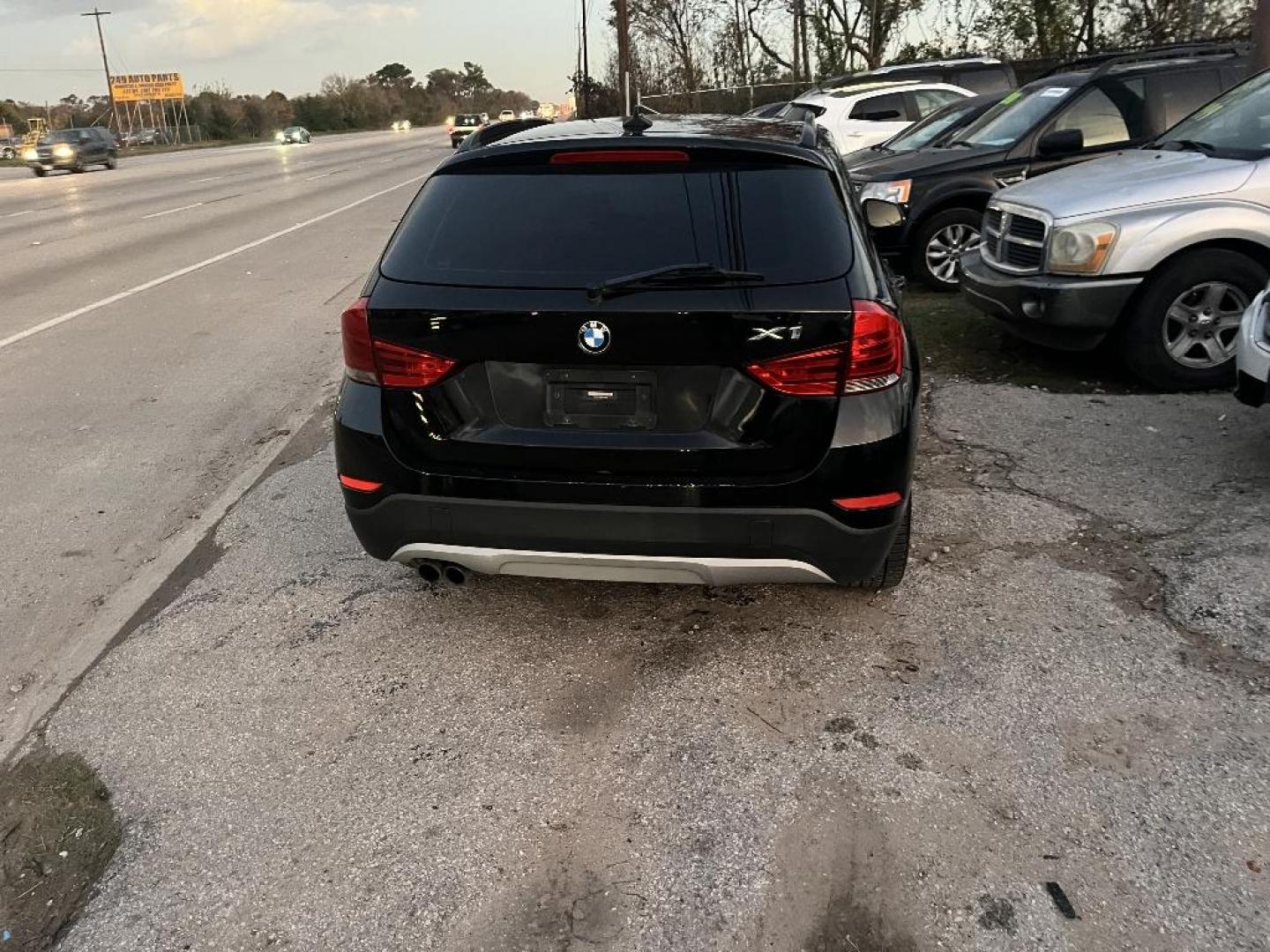 2014 BLACK BMW X1 xDrive28i (WBAVL1C59EV) with an 2.0L L4 DOHC 16V engine, AUTOMATIC transmission, located at 2303 West Mt. Houston, Houston, 77038, (281) 507-3956, 29.771597, -95.339569 - Photo#6