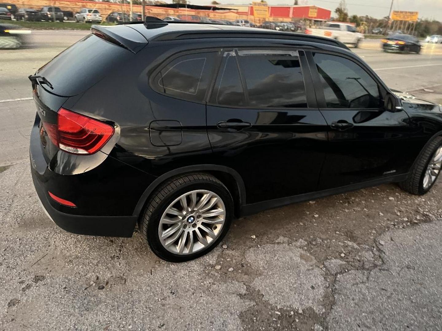 2014 BLACK BMW X1 xDrive28i (WBAVL1C59EV) with an 2.0L L4 DOHC 16V engine, AUTOMATIC transmission, located at 2303 West Mt. Houston, Houston, 77038, (281) 507-3956, 29.771597, -95.339569 - Photo#7