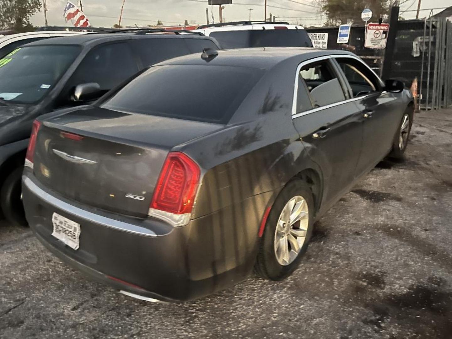 2015 GRAY CHRYSLER 300 Limited RWD (2C3CCAAG4FH) with an 3.6L V6 SOHC 24V engine, AUTOMATIC transmission, located at 2303 West Mt. Houston, Houston, 77038, (281) 507-3956, 29.771597, -95.339569 - Photo#1