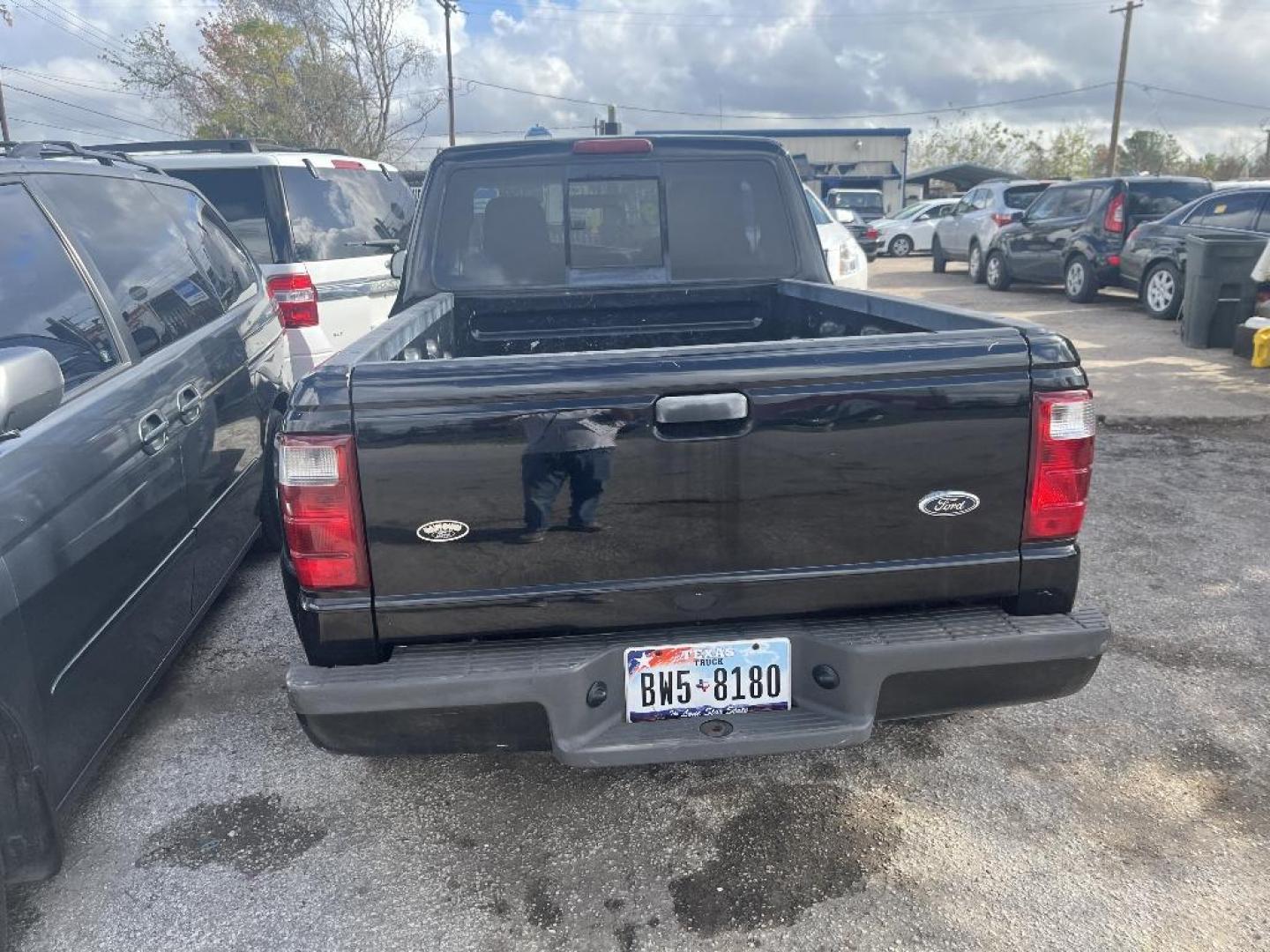 2004 BLACK FORD RANGER Edge SuperCab 3.0L 2WD (1FTYR14U94P) with an 3.0L V6 OHV 12V engine, AUTOMATIC transmission, located at 2303 West Mt. Houston, Houston, 77038, (281) 507-3956, 29.771597, -95.339569 - Photo#4