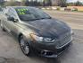 2016 GRAY FORD FUSION Titanium (3FA6P0K97GR) with an 2.0L L4 DOHC 16V engine, AUTOMATIC transmission, located at 2303 West Mt. Houston, Houston, 77038, (281) 507-3956, 29.771597, -95.339569 - Photo#2