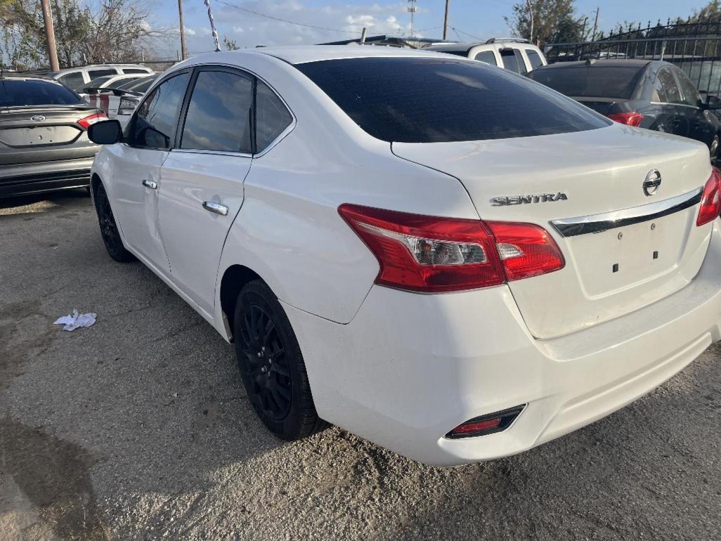 2018 WHITE NISSAN SENTRA S 6MT (3N1AB7AP4JY) with an 1.8L L4 SFI DOHC 16V engine, AUTOMATIC transmission, located at 2303 West Mt. Houston, Houston, 77038, (281) 507-3956, 29.771597, -95.339569 - Photo#2