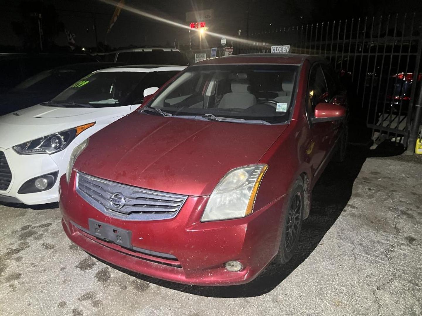 2012 RED NISSAN SENTRA 2.0 (3N1AB6AP7CL) with an 2.0L L4 DOHC 16V engine, AUTOMATIC transmission, located at 2303 West Mt. Houston, Houston, 77038, (281) 507-3956, 29.771597, -95.339569 - Photo#0