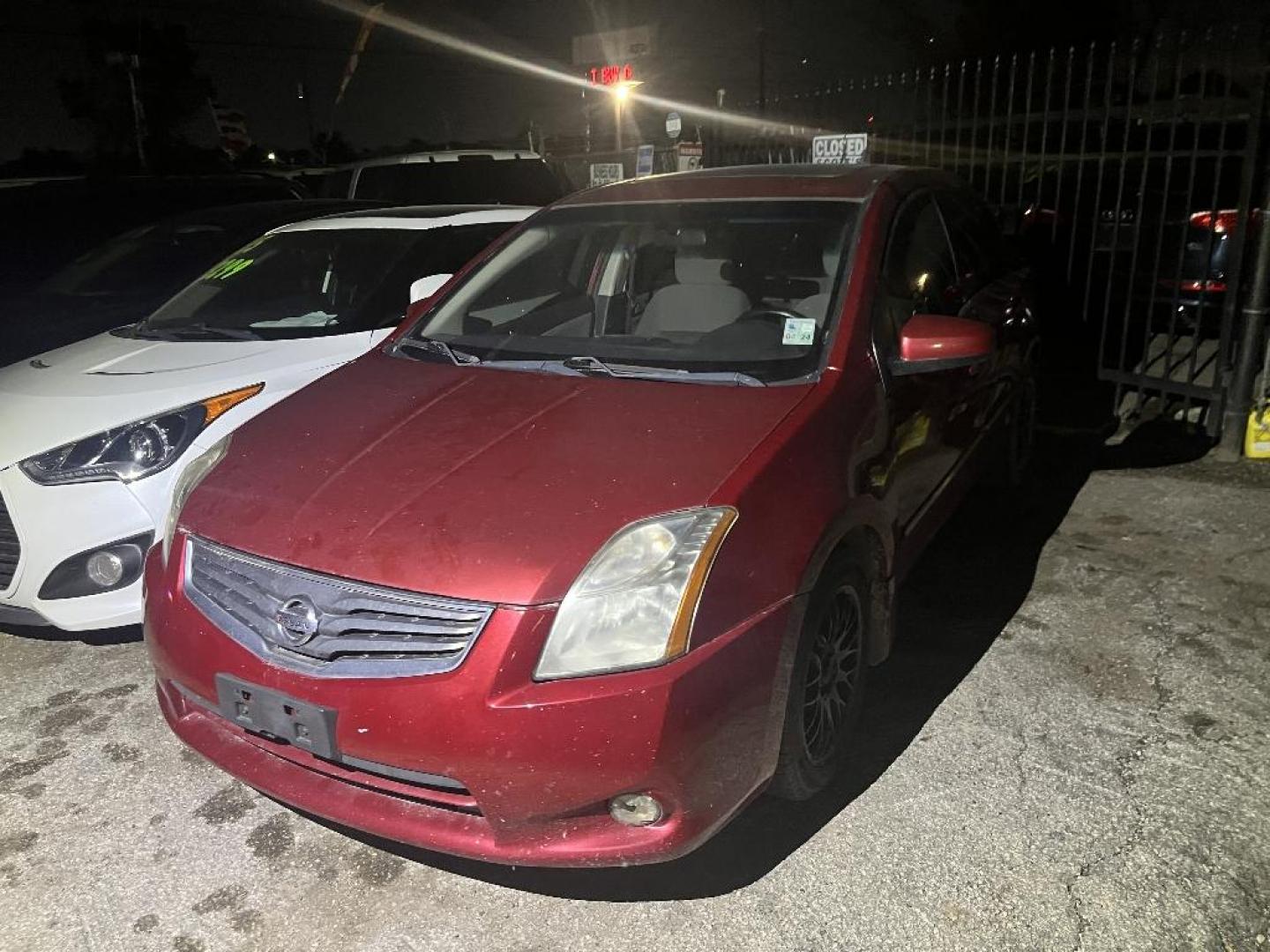 2012 RED NISSAN SENTRA 2.0 (3N1AB6AP7CL) with an 2.0L L4 DOHC 16V engine, AUTOMATIC transmission, located at 2303 West Mt. Houston, Houston, 77038, (281) 507-3956, 29.771597, -95.339569 - Photo#5