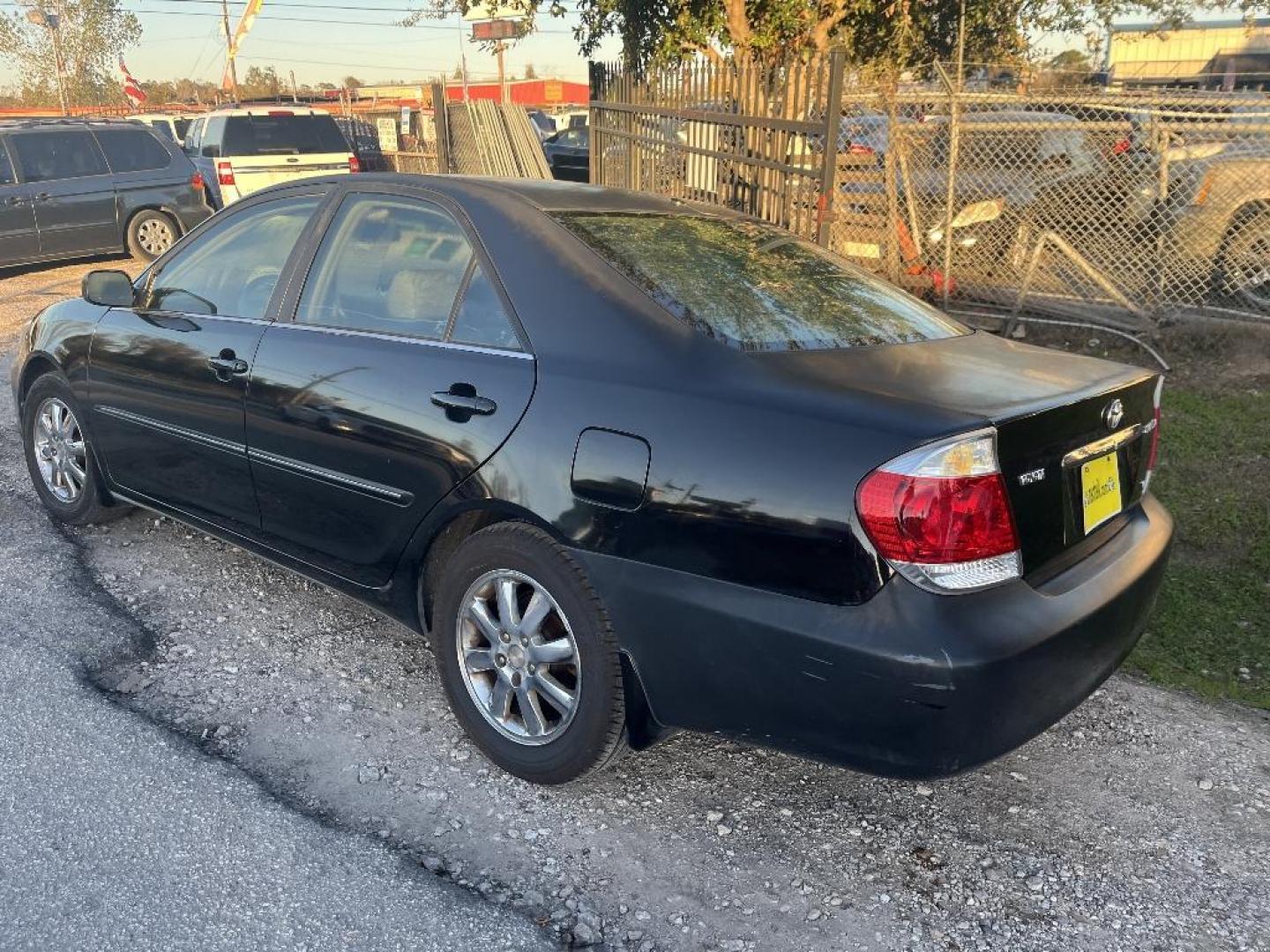 2005 BLACK TOYOTA CAMRY LE V6 (4T1BF32K35U) with an 3.0L V6 DOHC 24V engine, AUTOMATIC transmission, located at 2303 West Mt. Houston, Houston, 77038, (281) 507-3956, 29.771597, -95.339569 - Photo#2