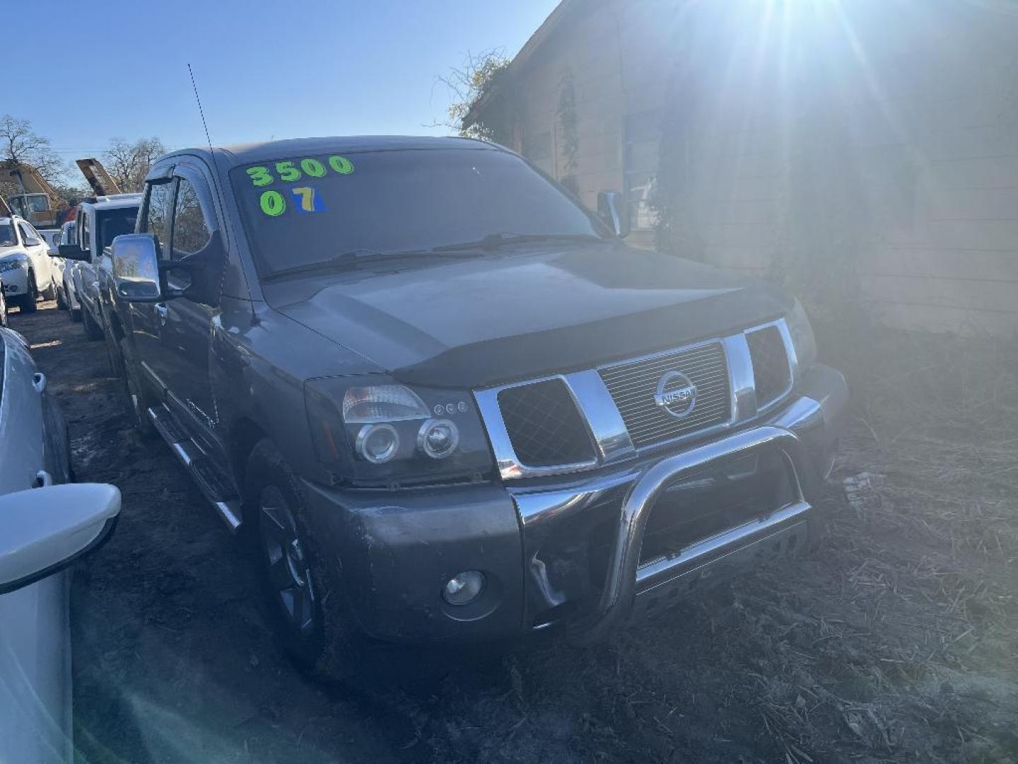 2007 GRAY NISSAN TITAN LE Crew Cab 2WD (1N6BA07A17N) with an 5.6L V8 DOHC 32V FFV engine, AUTOMATIC transmission, located at 2303 West Mt. Houston, Houston, 77038, (281) 507-3956, 29.771597, -95.339569 - Photo#0