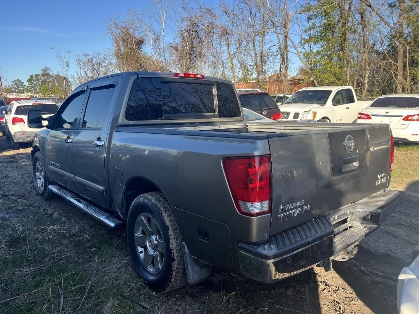 2007 GRAY NISSAN TITAN LE Crew Cab 2WD (1N6BA07A17N) with an 5.6L V8 DOHC 32V FFV engine, AUTOMATIC transmission, located at 2303 West Mt. Houston, Houston, 77038, (281) 507-3956, 29.771597, -95.339569 - Photo#2