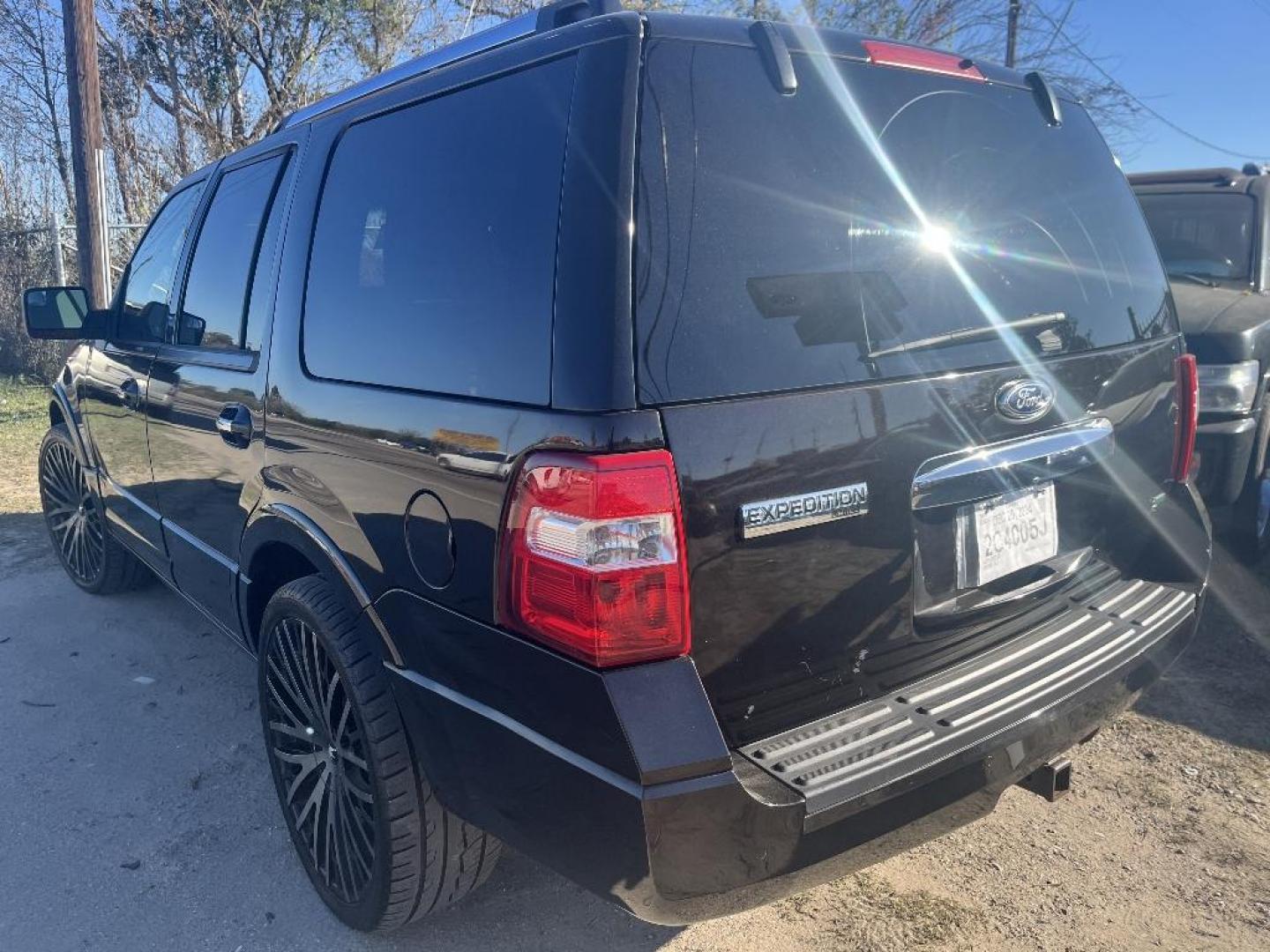 2013 BLACK FORD EXPEDITION Limited 2WD (1FMJU1K59DE) with an 5.4L V8 SOHC 16V FFV engine, AUTOMATIC transmission, located at 2303 West Mt. Houston, Houston, 77038, (281) 507-3956, 29.771597, -95.339569 - Photo#1