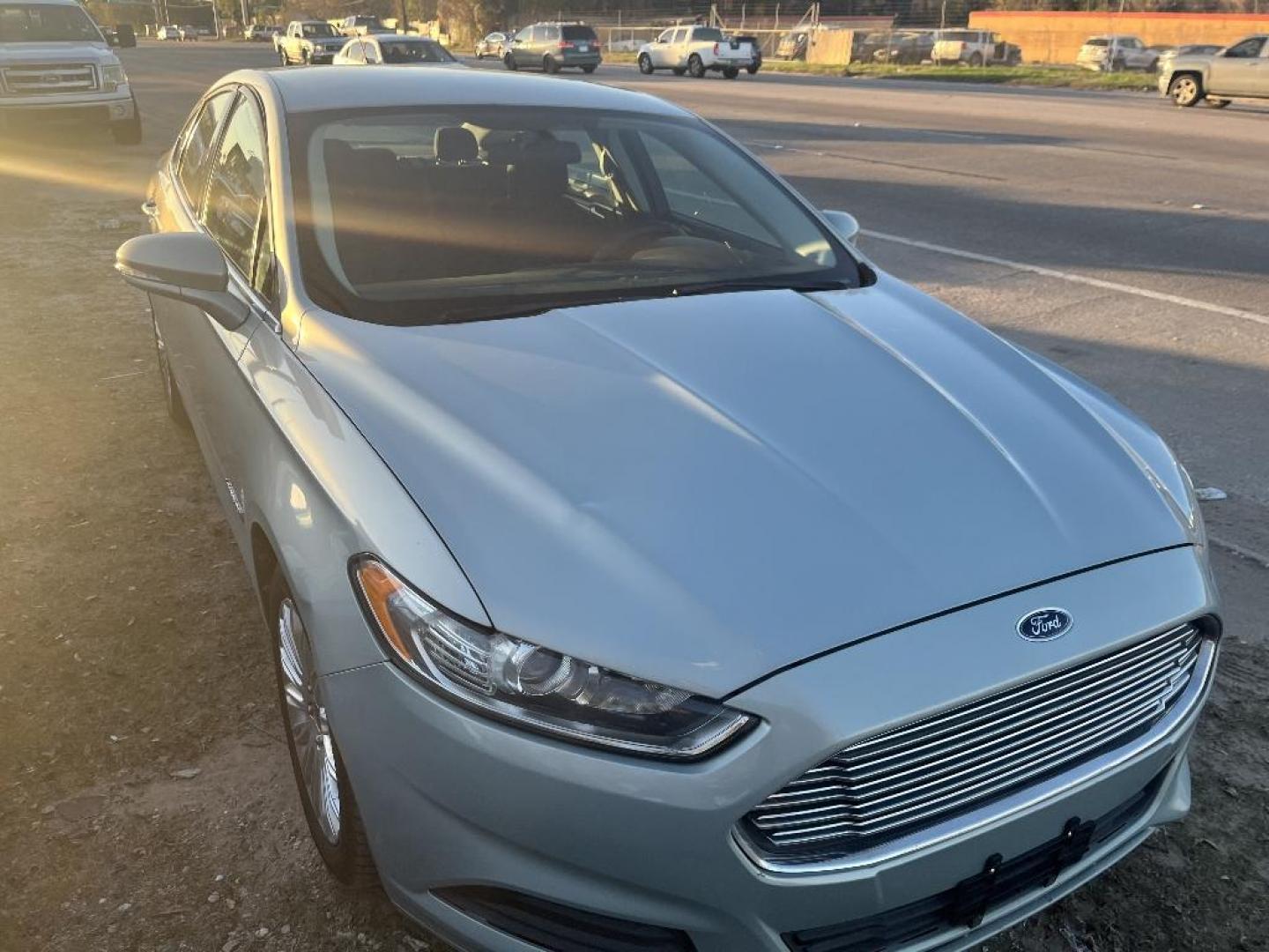 2013 GRAY FORD FUSION HYBRID SE (3FA6P0LU7DR) with an 2.0L L4 DOHC 16V HYBRID engine, AUTOMATIC transmission, located at 2303 West Mt. Houston, Houston, 77038, (281) 507-3956, 29.771597, -95.339569 - Photo#1