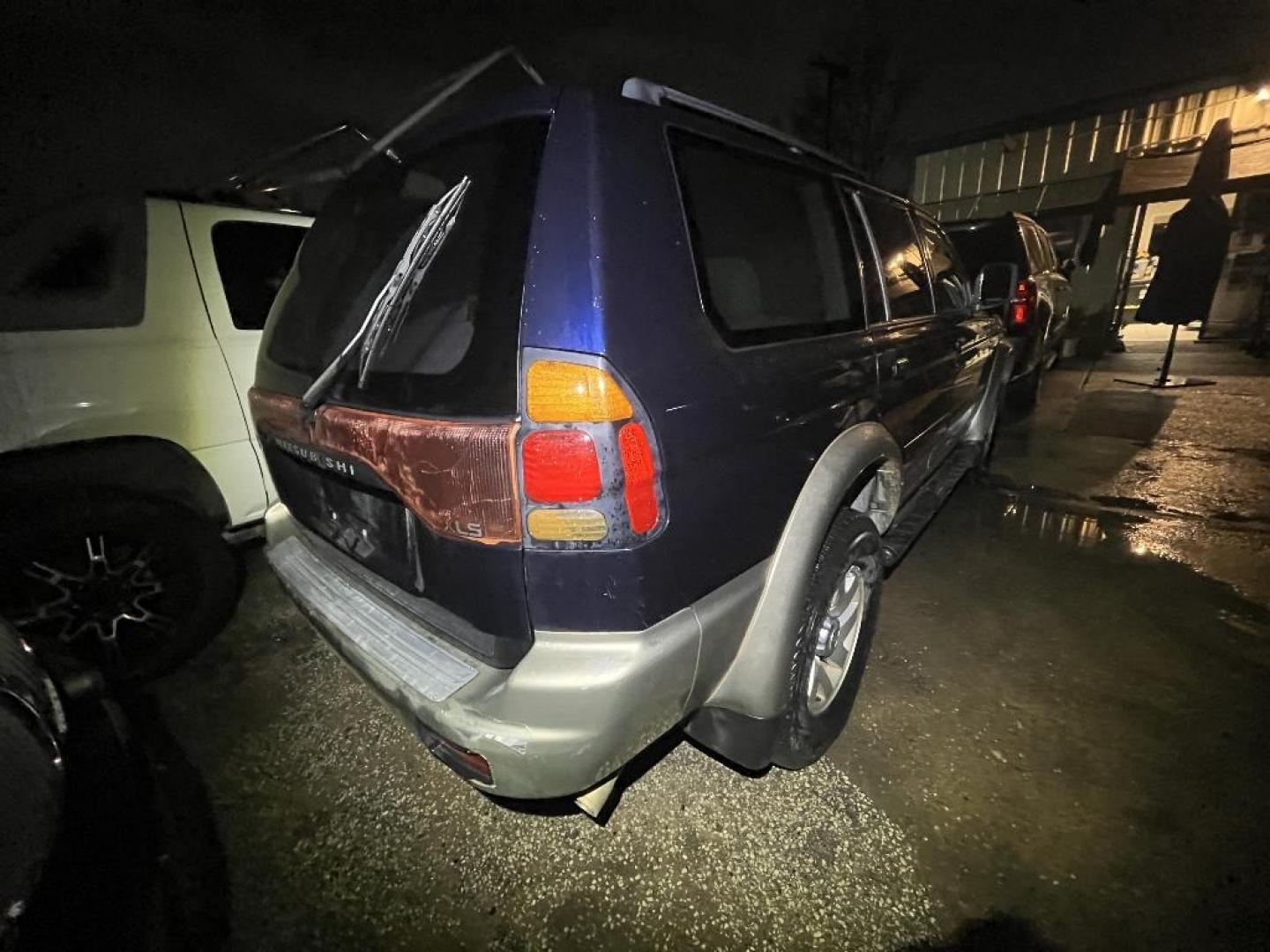 2002 BLUE MITSUBISHI MONTERO SPORT XLS 2WD (JA4LS31R22J) with an 3.5L V6 SOHC 24V engine, AUTOMATIC transmission, located at 2303 West Mt. Houston, Houston, 77038, (281) 507-3956, 29.771597, -95.339569 - Photo#2