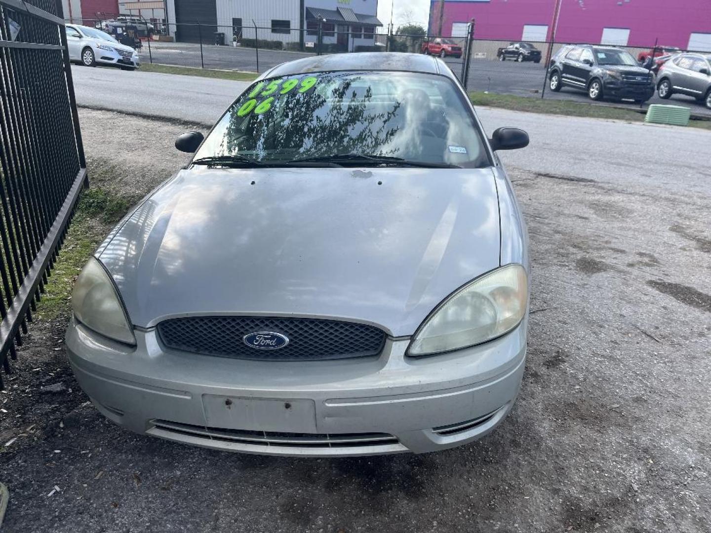 2006 BROWN FORD TAURUS SE (1FAHP53266A) with an 3.0L V6 OHV 12V FFV engine, AUTOMATIC transmission, located at 2303 West Mt. Houston, Houston, 77038, (281) 507-3956, 29.771597, -95.339569 - Photo#0