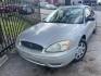 2006 BROWN FORD TAURUS SE (1FAHP53266A) with an 3.0L V6 OHV 12V FFV engine, AUTOMATIC transmission, located at 2303 West Mt. Houston, Houston, 77038, (281) 507-3956, 29.771597, -95.339569 - Photo#1