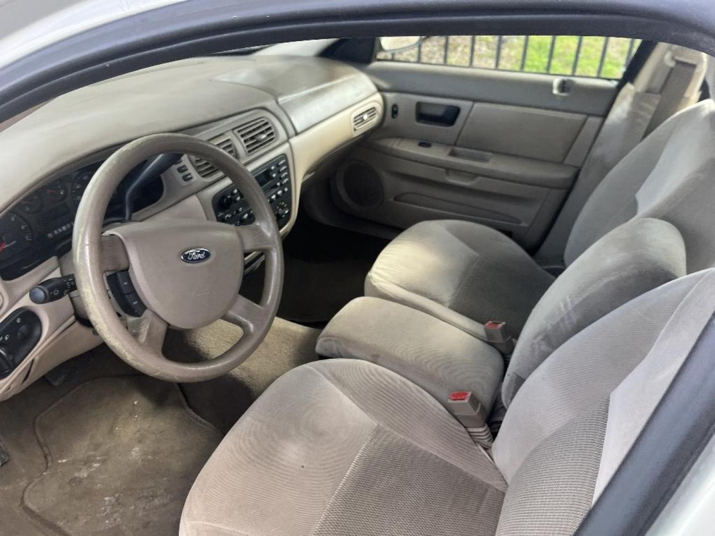 2006 BROWN FORD TAURUS SE (1FAHP53266A) with an 3.0L V6 OHV 12V FFV engine, AUTOMATIC transmission, located at 2303 West Mt. Houston, Houston, 77038, (281) 507-3956, 29.771597, -95.339569 - Photo#3