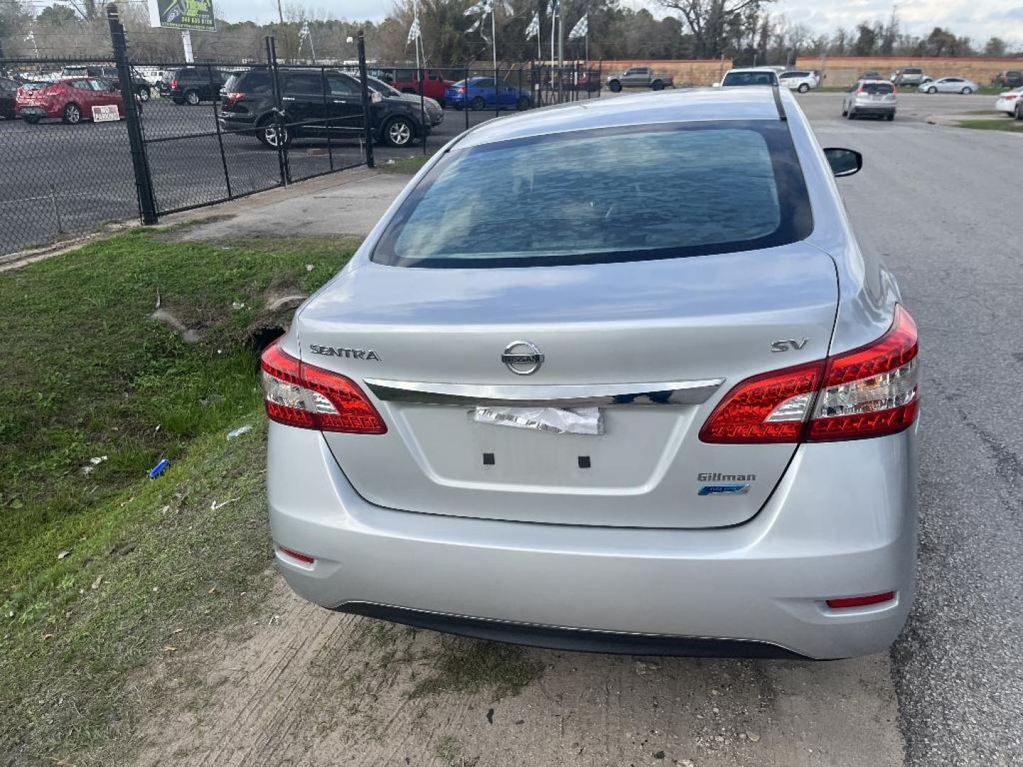 2014 WHITE NISSAN SENTRA S 6MT (3N1AB7AP2EY) with an 1.8L L4 SFI DOHC 16V engine, AUTOMATIC transmission, located at 2303 West Mt. Houston, Houston, 77038, (281) 507-3956, 29.771597, -95.339569 - Photo#2