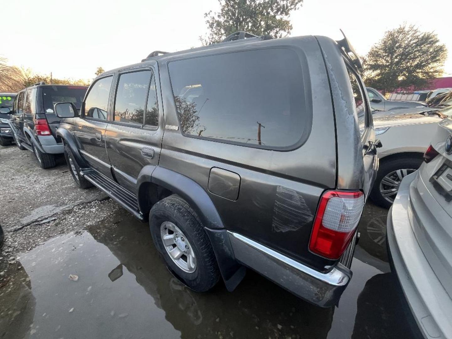 1998 BROWN TOYOTA 4RUNNER Limited 4WD (JT3HN87R0W0) with an 3.4L V6 DOHC 24V engine, AUTOMATIC transmission, located at 2303 West Mt. Houston, Houston, 77038, (281) 507-3956, 29.771597, -95.339569 - Photo#1