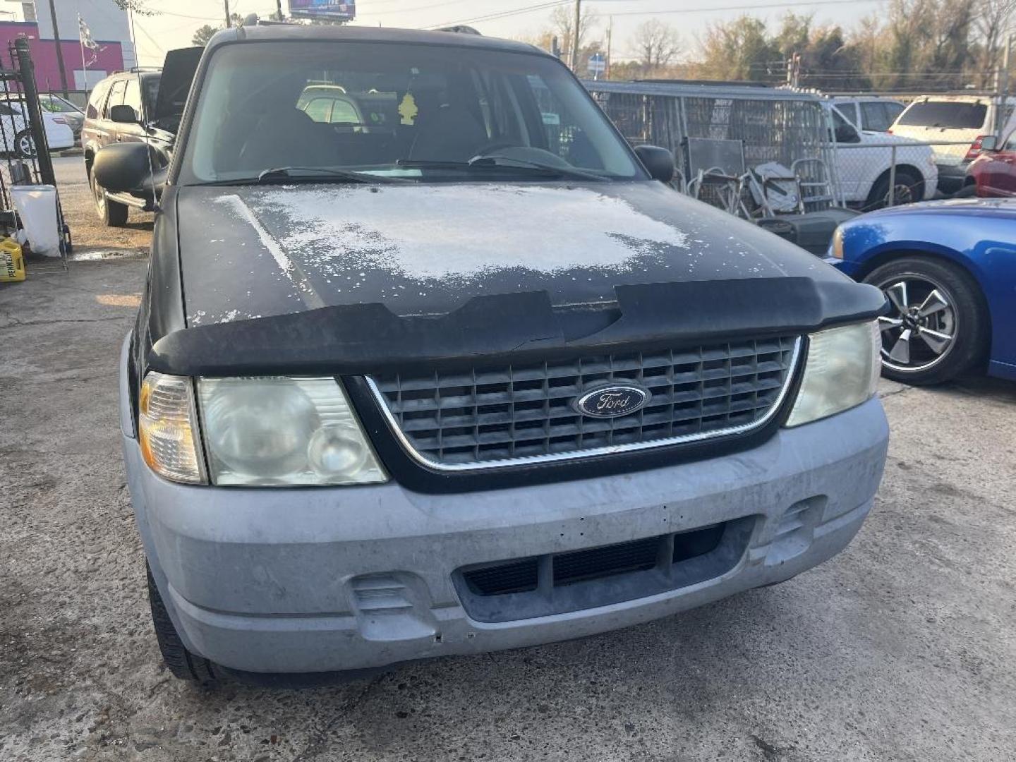 2002 BLACK FORD EXPLORER XLS 4WD (1FMZU72E22Z) with an 4.0L V6 SOHC 16V engine, AUTOMATIC transmission, located at 2303 West Mt. Houston, Houston, 77038, (281) 507-3956, 29.771597, -95.339569 - Photo#0