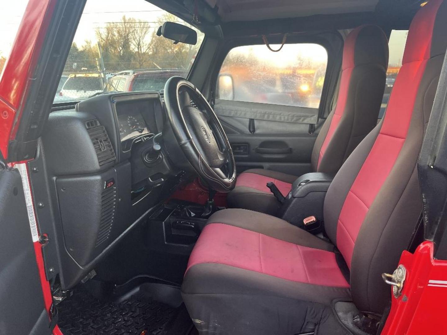 2006 RED JEEP WRANGLER X (1J4FA39S26P) with an 4.0L L6 OHV 12V engine, MANUAL transmission, located at 2303 West Mt. Houston, Houston, 77038, (281) 507-3956, 29.771597, -95.339569 - Photo#3