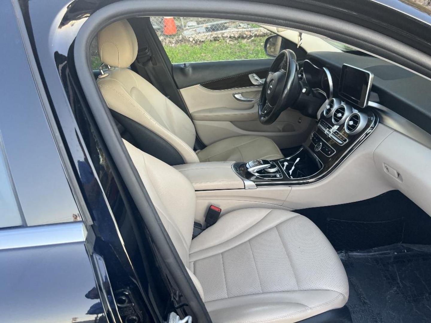 2016 BLACK MERCEDES-BENZ C-CLASS C300 Sedan (55SWF4JB6GU) with an 2.0L L4 DOHC 16V engine, AUTOMATIC transmission, located at 2303 West Mt. Houston, Houston, 77038, (281) 507-3956, 29.771597, -95.339569 - Photo#1