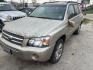 2006 BROWN TOYOTA HIGHLANDER HYBRID Limited 2WD (JTEDW21AX60) with an 3.3L V6 DOHC 24V HYBRID engine, AUTOMATIC transmission, located at 2303 West Mt. Houston, Houston, 77038, (281) 507-3956, 29.771597, -95.339569 - Photo#1