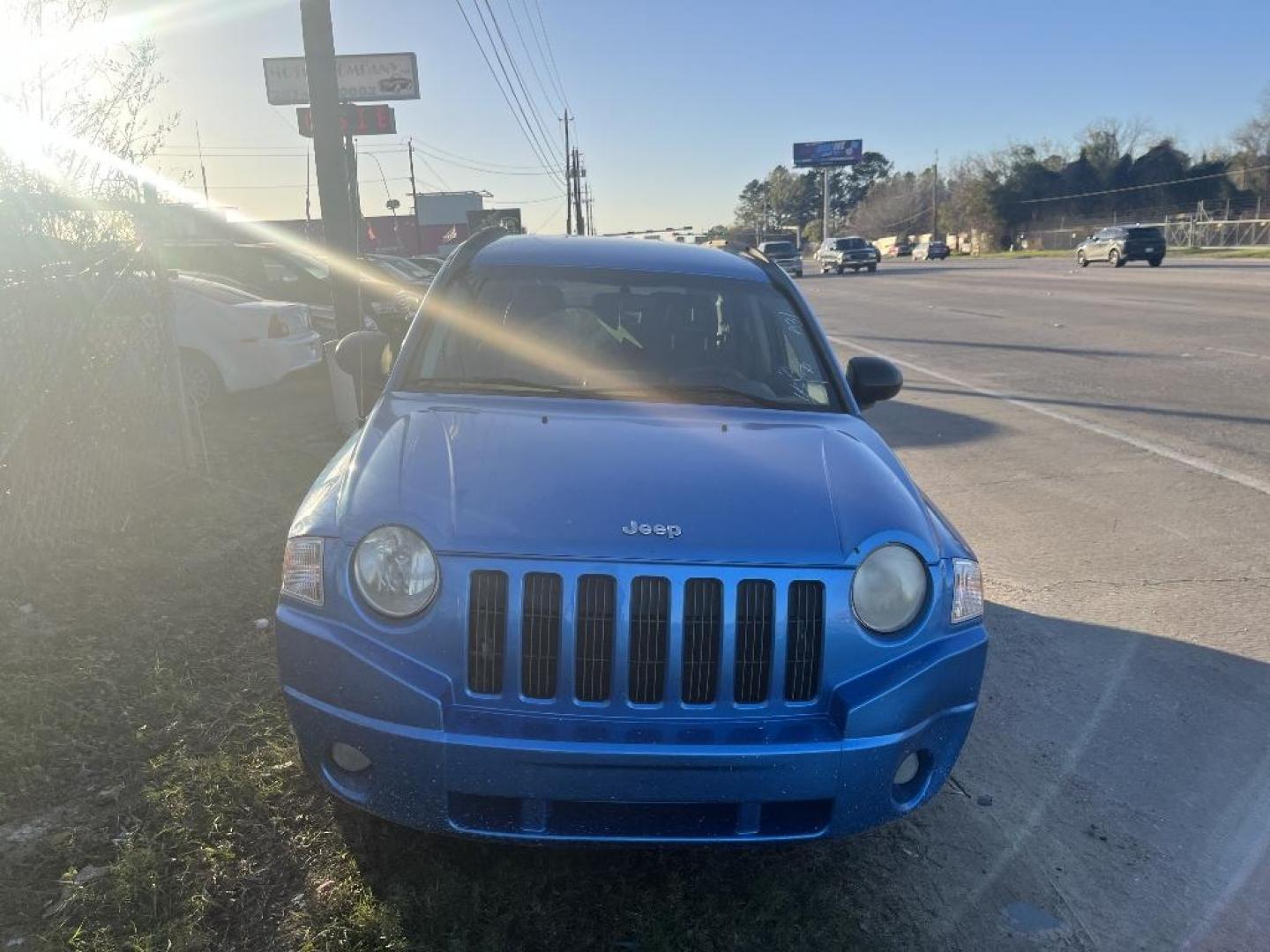 2008 BLUE JEEP COMPASS Sport 2WD (1J8FT47W98D) with an 2.4L L4 DOHC 16V engine, AUTOMATIC transmission, located at 2303 West Mt. Houston, Houston, 77038, (281) 507-3956, 29.771597, -95.339569 - Photo#0