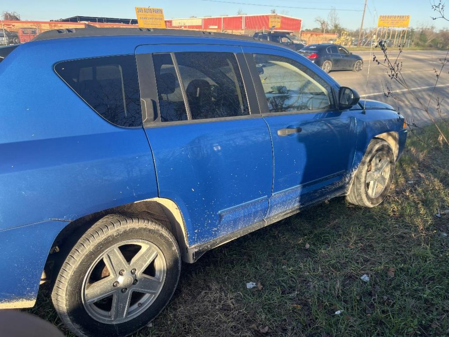 2008 BLUE JEEP COMPASS Sport 2WD (1J8FT47W98D) with an 2.4L L4 DOHC 16V engine, AUTOMATIC transmission, located at 2303 West Mt. Houston, Houston, 77038, (281) 507-3956, 29.771597, -95.339569 - Photo#2