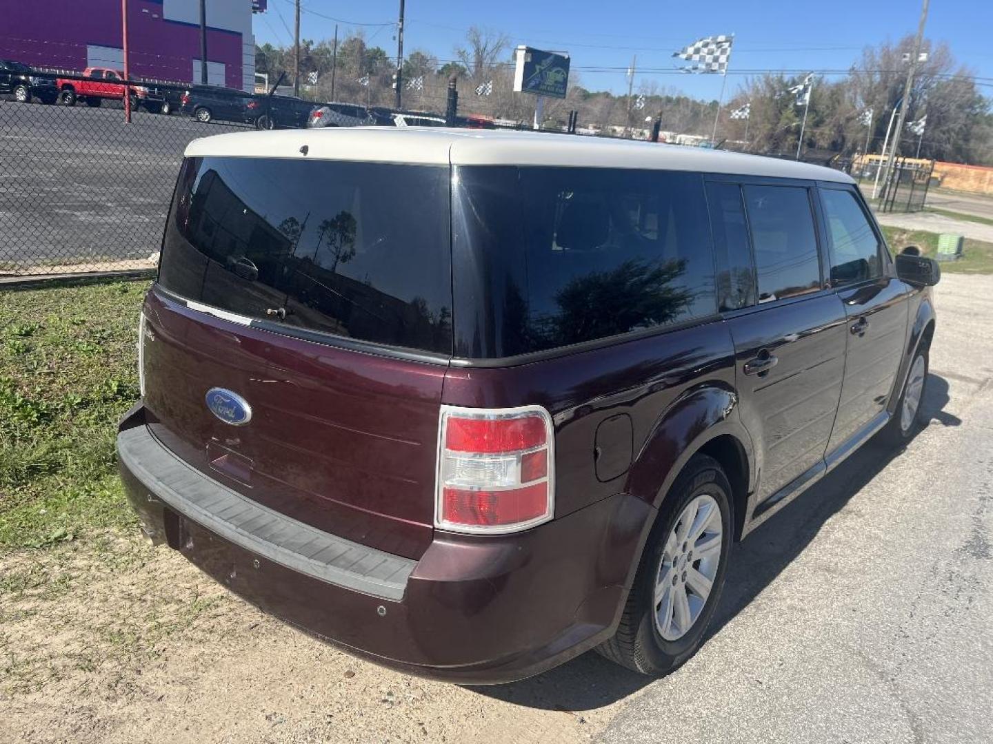 2011 BROWN FORD FLEX SE FWD (2FMGK5BC7BB) with an 3.5L V6 DOHC 24V engine, AUTOMATIC transmission, located at 2303 West Mt. Houston, Houston, 77038, (281) 507-3956, 29.771597, -95.339569 - Photo#2