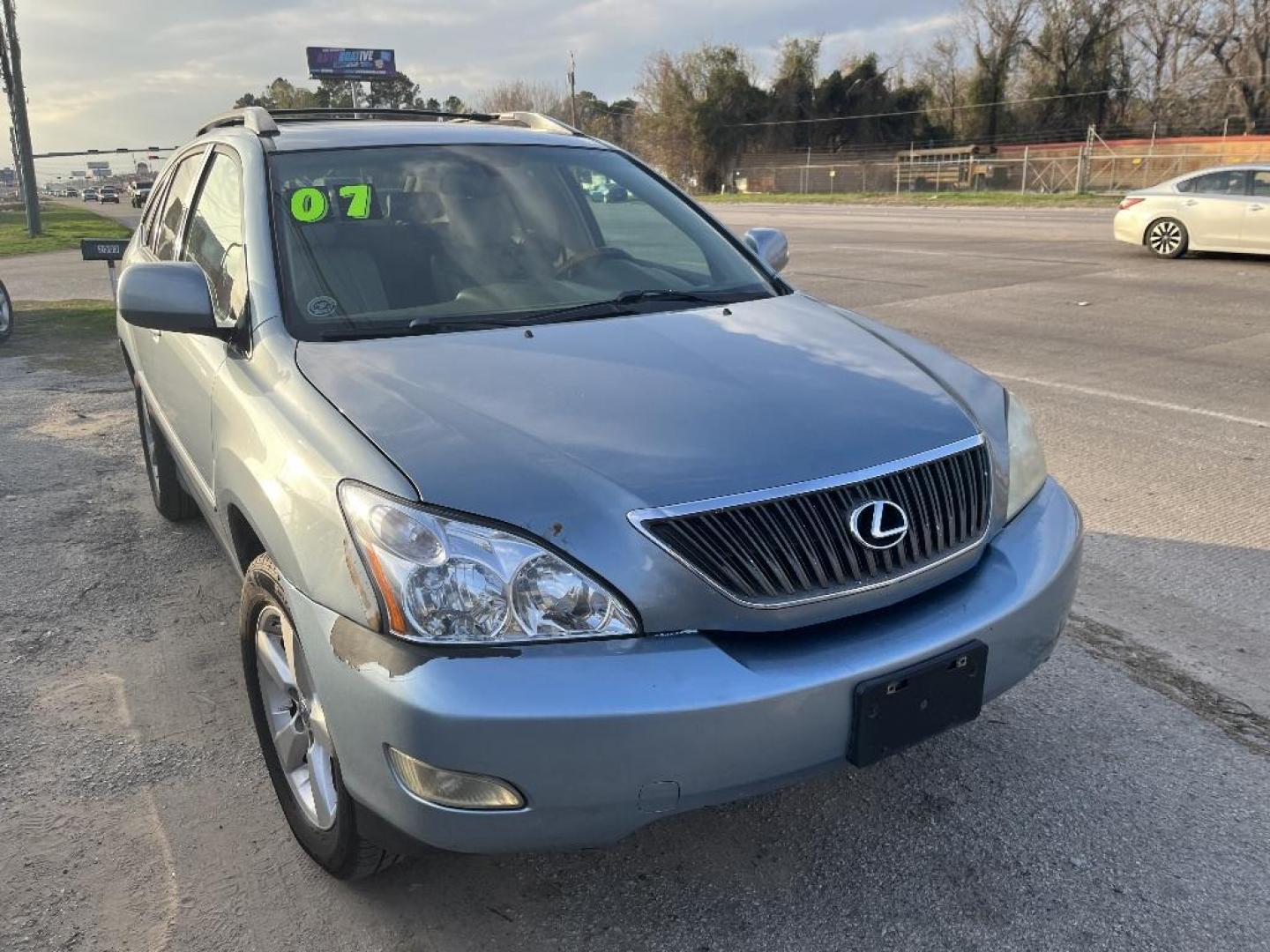 2007 BLUE LEXUS RX 350 FWD (2T2GK31U87C) with an 3.5L V6 DOHC 24V engine, AUTOMATIC transmission, located at 2303 West Mt. Houston, Houston, 77038, (281) 507-3956, 29.771597, -95.339569 - Photo#0