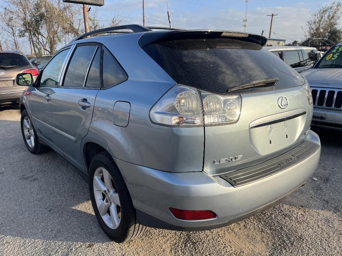 2007 BLUE LEXUS RX 350 FWD (2T2GK31U87C) with an 3.5L V6 DOHC 24V engine, AUTOMATIC transmission, located at 2303 West Mt. Houston, Houston, 77038, (281) 507-3956, 29.771597, -95.339569 - Photo#1