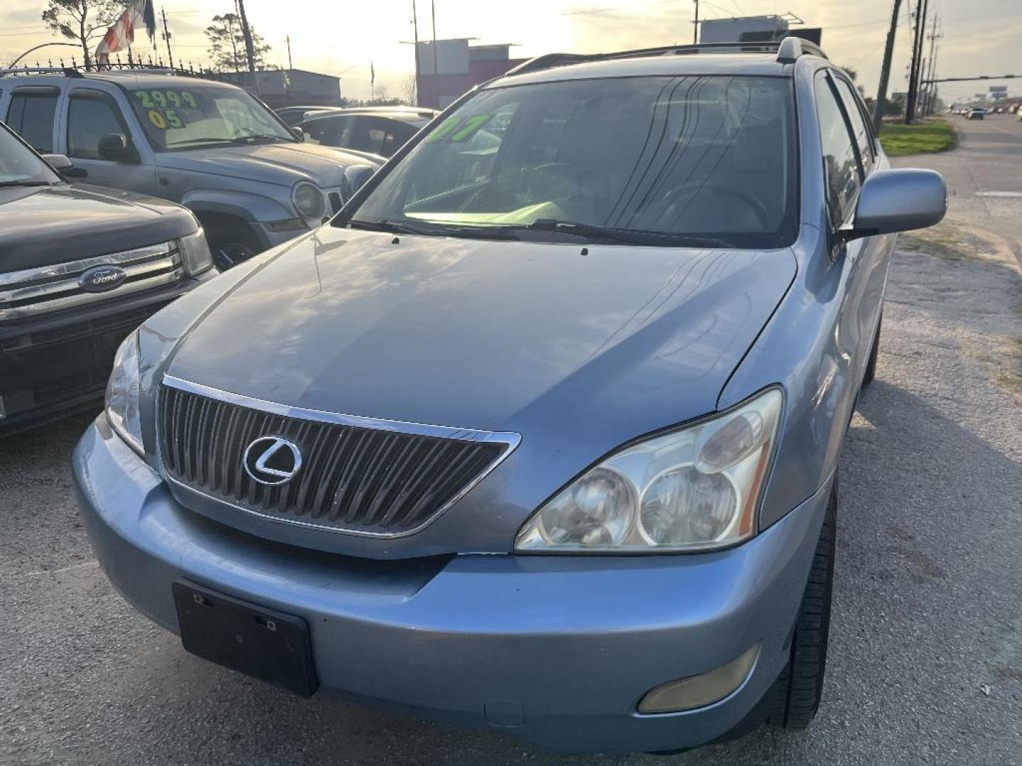 2007 BLUE LEXUS RX 350 FWD (2T2GK31U87C) with an 3.5L V6 DOHC 24V engine, AUTOMATIC transmission, located at 2303 West Mt. Houston, Houston, 77038, (281) 507-3956, 29.771597, -95.339569 - Photo#6