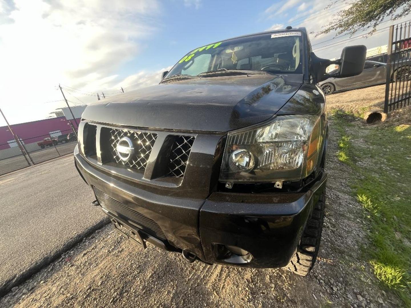 2008 BLACK NISSAN TITAN LE Crew Cab 4WD SWB (1N6AA07C18N) with an 5.6L V8 DOHC 32V engine, AUTOMATIC transmission, located at 2303 West Mt. Houston, Houston, 77038, (281) 507-3956, 29.771597, -95.339569 - Photo#4