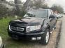 2009 BLACK HONDA RIDGELINE RTL w/ Navigation (5FPYK16599B) with an 3.5L V6 SOHC 24V engine, AUTOMATIC transmission, located at 2303 West Mt. Houston, Houston, 77038, (281) 507-3956, 29.771597, -95.339569 - Photo#0