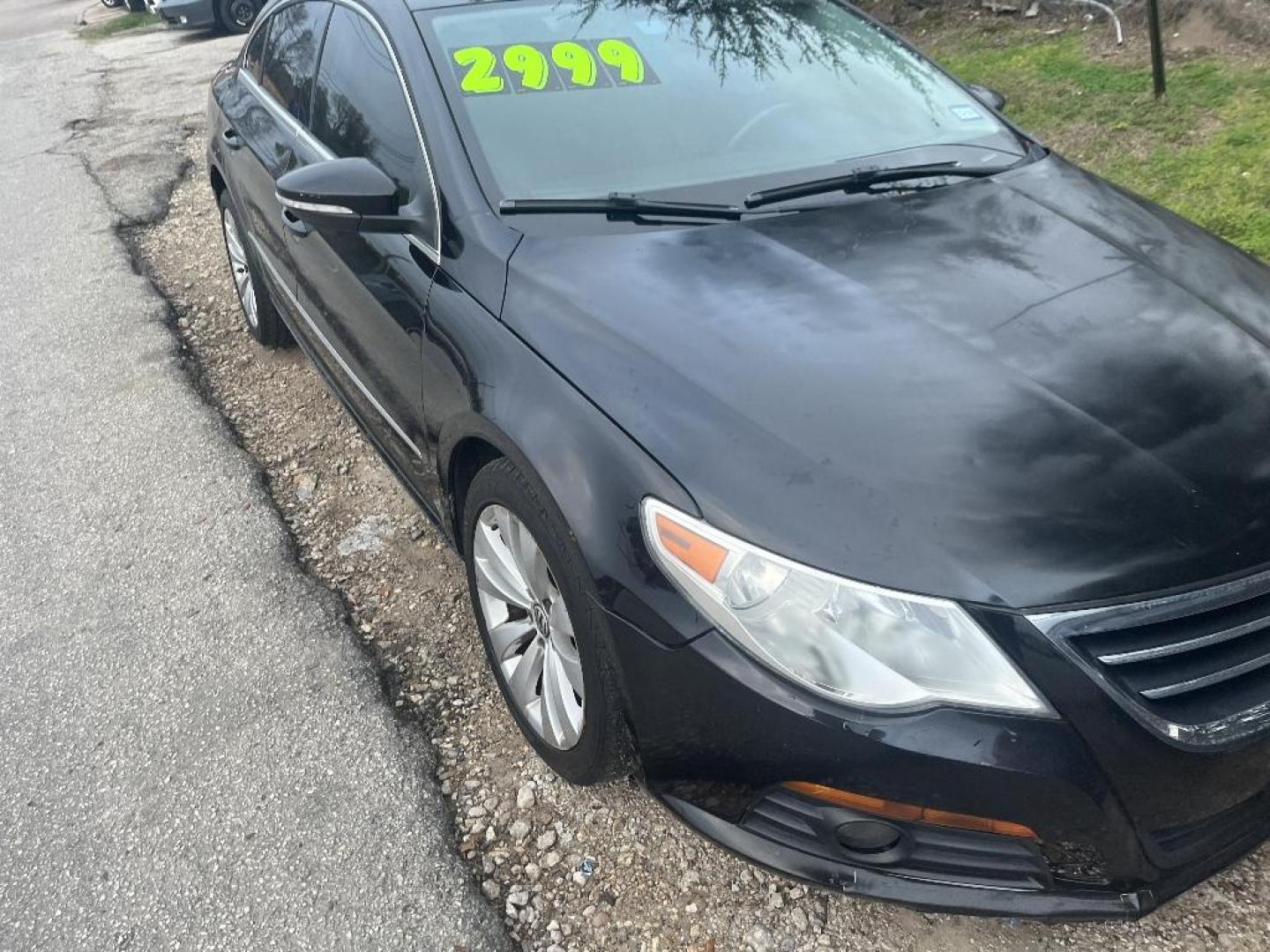 2009 BLACK VOLKSWAGEN CC Sport (WVWML73C29E) with an 2.0L L4 DOHC 16V TURBO engine, AUTOMATIC transmission, located at 2303 West Mt. Houston, Houston, 77038, (281) 507-3956, 29.771597, -95.339569 - Photo#0