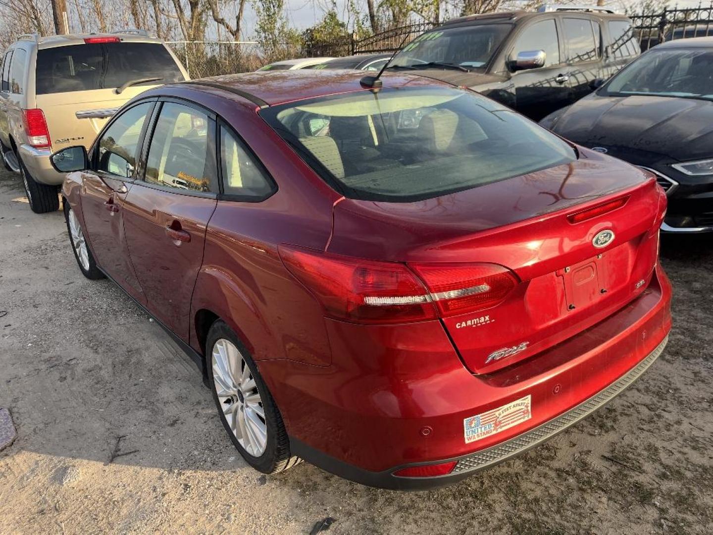 2017 RED FORD FOCUS SEL Sedan (1FADP3H24HL) with an 2.0L L4 DOHC 16V engine, AUTOMATIC transmission, located at 2303 West Mt. Houston, Houston, 77038, (281) 507-3956, 29.771597, -95.339569 - Photo#1