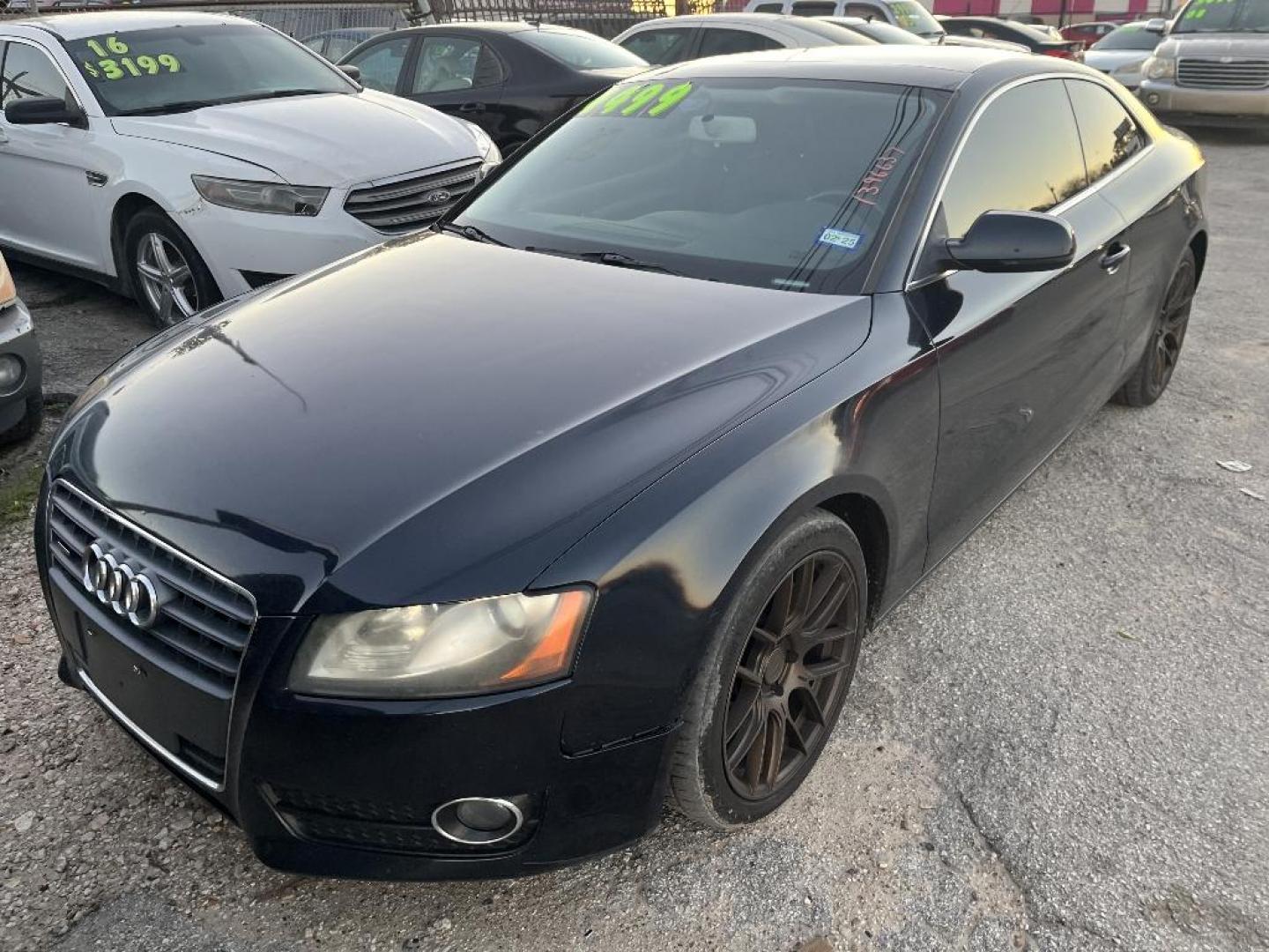 2011 BLACK AUDI A5 Coupe 2.0T quattro Tiptronic (WAUCFAFR6BA) with an 2.0L L4 DOHC 16V TURBO engine, AUTOMATIC transmission, located at 2303 West Mt. Houston, Houston, 77038, (281) 507-3956, 29.771597, -95.339569 - Photo#0