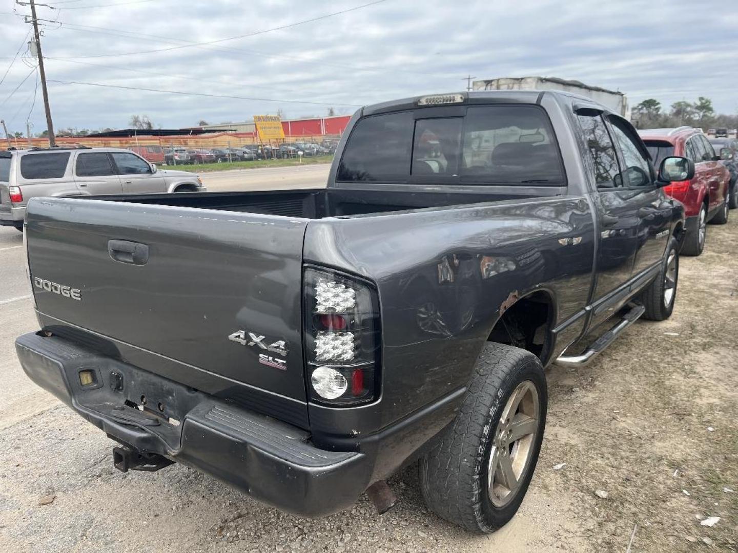 2004 BLUE DODGE RAM 1500 ST Quad Cab 4WD (1D7HU18D94S) with an 5.7L V8 OHV 16V engine, AUTOMATIC transmission, located at 2303 West Mt. Houston, Houston, 77038, (281) 507-3956, 29.771597, -95.339569 - Photo#1