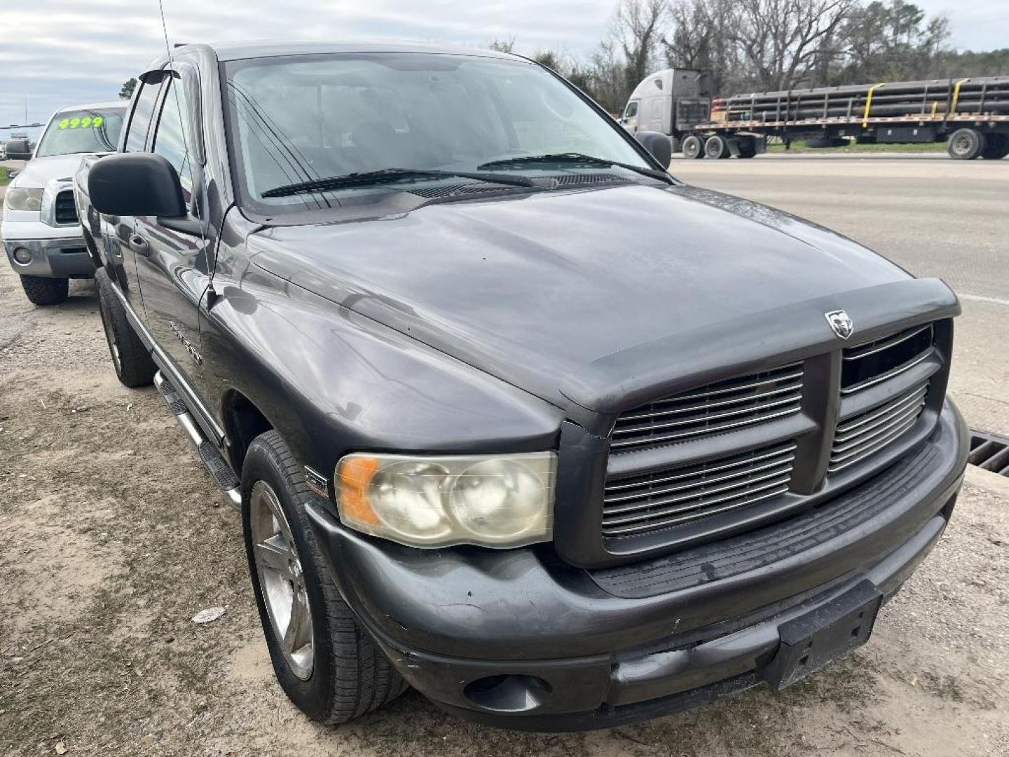 2004 BLUE DODGE RAM 1500 ST Quad Cab 4WD (1D7HU18D94S) with an 5.7L V8 OHV 16V engine, AUTOMATIC transmission, located at 2303 West Mt. Houston, Houston, 77038, (281) 507-3956, 29.771597, -95.339569 - Photo#2