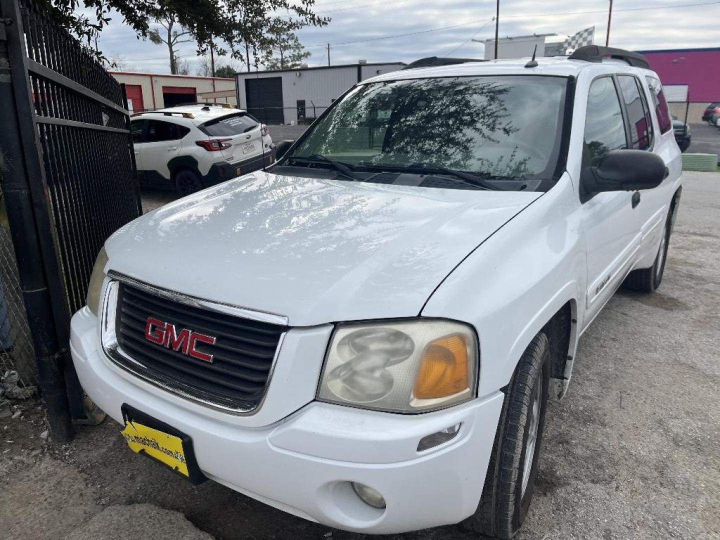 2005 WHITE GMC ENVOY XL SLE 2WD (1GKES16S856) with an 4.2L L6 DOHC 24V engine, AUTOMATIC transmission, located at 2303 West Mt. Houston, Houston, 77038, (281) 507-3956, 29.771597, -95.339569 - Photo#0