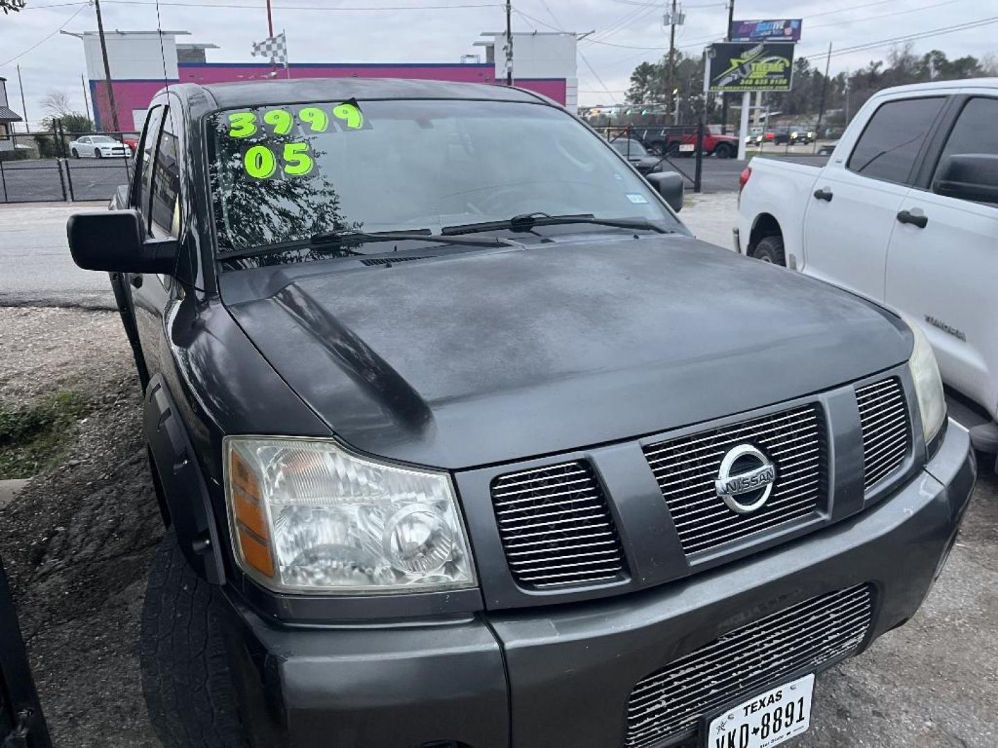 2005 GRAY NISSAN TITAN XE Crew Cab 2WD (1N6BA07A55N) with an 5.6L V8 DOHC 32V FFV engine, AUTOMATIC transmission, located at 2303 West Mt. Houston, Houston, 77038, (281) 507-3956, 29.771597, -95.339569 - Photo#0