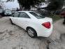 2006 WHITE PONTIAC G6 V6 Sedan (1G2ZG558164) with an 3.5L V6 OHV 12V engine, AUTOMATIC transmission, located at 2303 West Mt. Houston, Houston, 77038, (281) 507-3956, 29.771597, -95.339569 - Photo#2