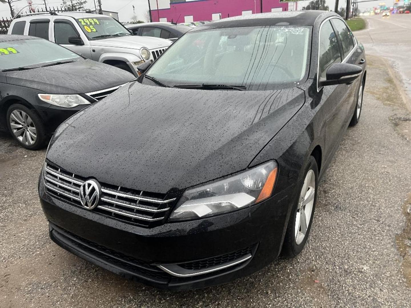 2012 BLACK VOLKSWAGEN PASSAT 2.0L TDI SE MT (1VWBN7A36CC) with an 2.0L L4 DOHC 16V TURBO DIESEL engine, AUTOMATIC transmission, located at 2303 West Mt. Houston, Houston, 77038, (281) 507-3956, 29.771597, -95.339569 - Photo#1