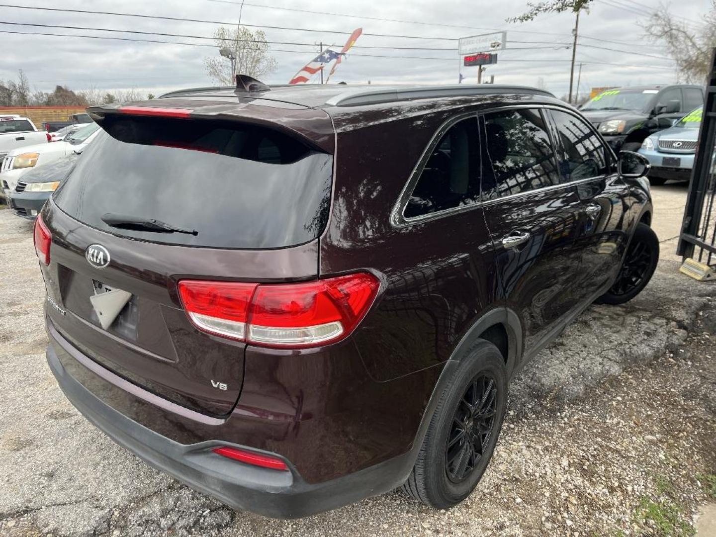 2016 RED KIA SORENTO LX V6 2WD (5XYPG4A51GG) with an 3.3L V6 DOHC 24V engine, AUTOMATIC transmission, located at 2303 West Mt. Houston, Houston, 77038, (281) 507-3956, 29.771597, -95.339569 - Photo#1