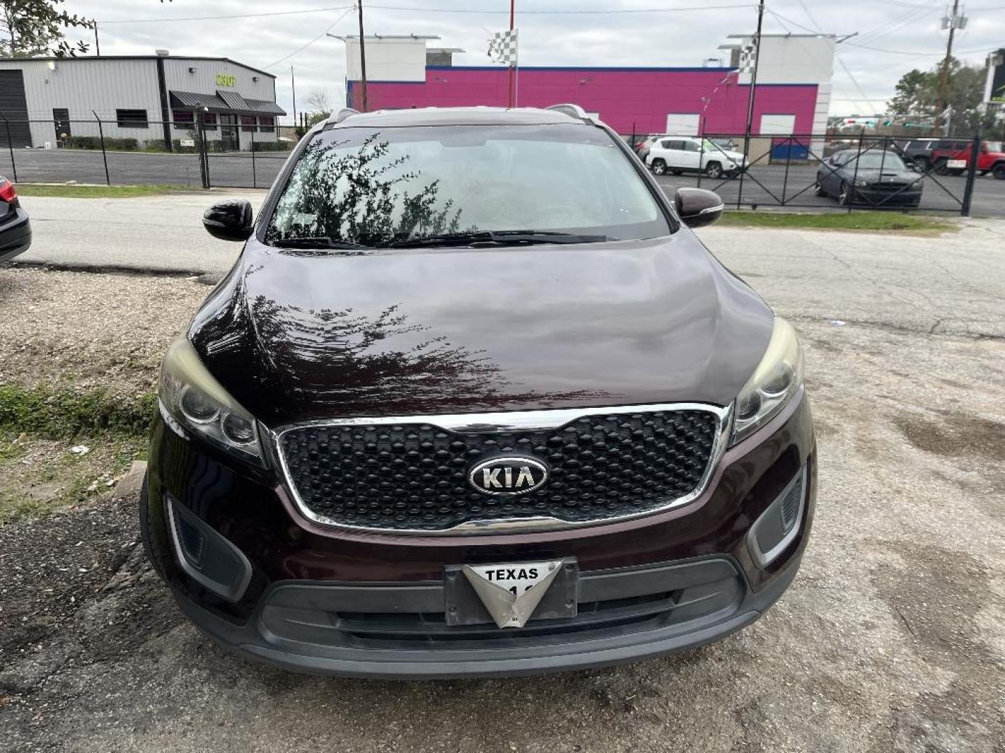 2016 RED KIA SORENTO LX V6 2WD (5XYPG4A51GG) with an 3.3L V6 DOHC 24V engine, AUTOMATIC transmission, located at 2303 West Mt. Houston, Houston, 77038, (281) 507-3956, 29.771597, -95.339569 - Photo#7