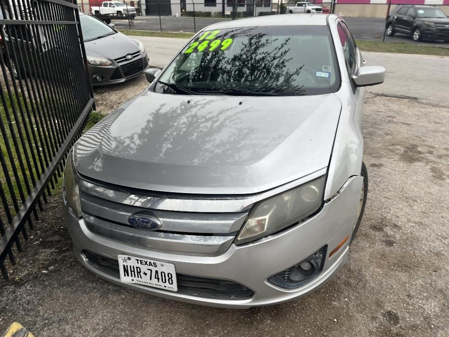 2012 GRAY FORD FUSION SE (3FAHP0HA7CR) with an 2.5L L4 DOHC 16V engine, AUTOMATIC transmission, located at 2303 West Mt. Houston, Houston, 77038, (281) 507-3956, 29.771597, -95.339569 - Photo#0